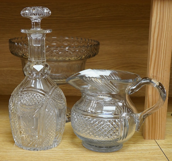 A collection of glassware to include a Waterford pedestal bowl, Georgian jug and a Victorian decanter, largest 28cm high
